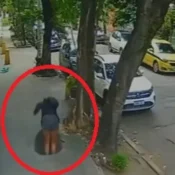 Mulher cai em bueiro no Rio e fica presa após tampa se fechar; veja